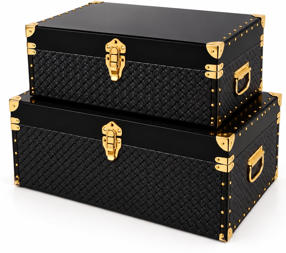 Marie luggage-style trunks in black with gold clasps